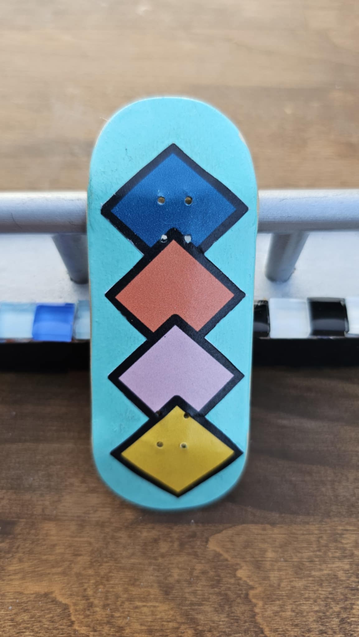 Diamond shape design fingerboards