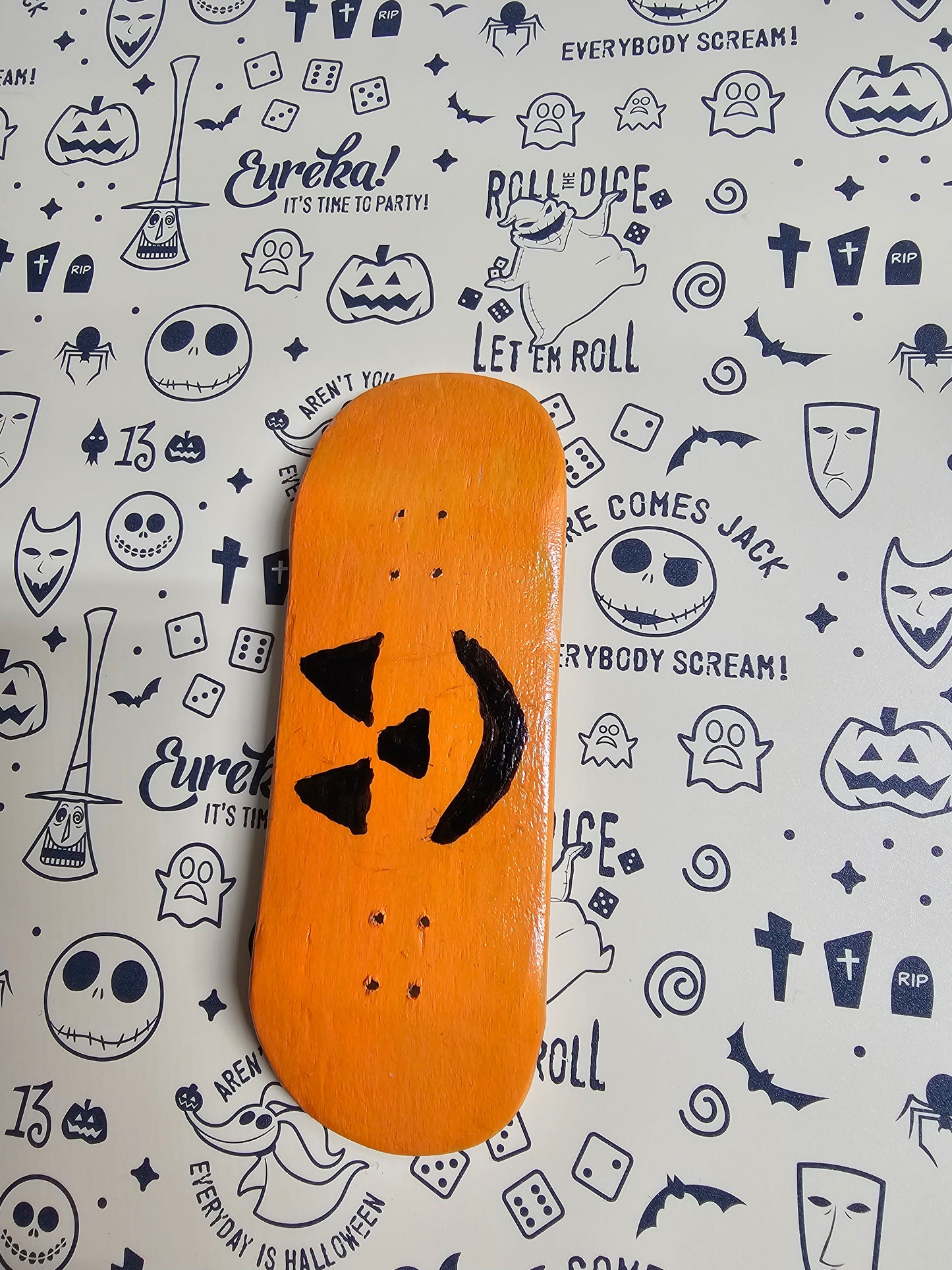 Pumpkin fingerboard.